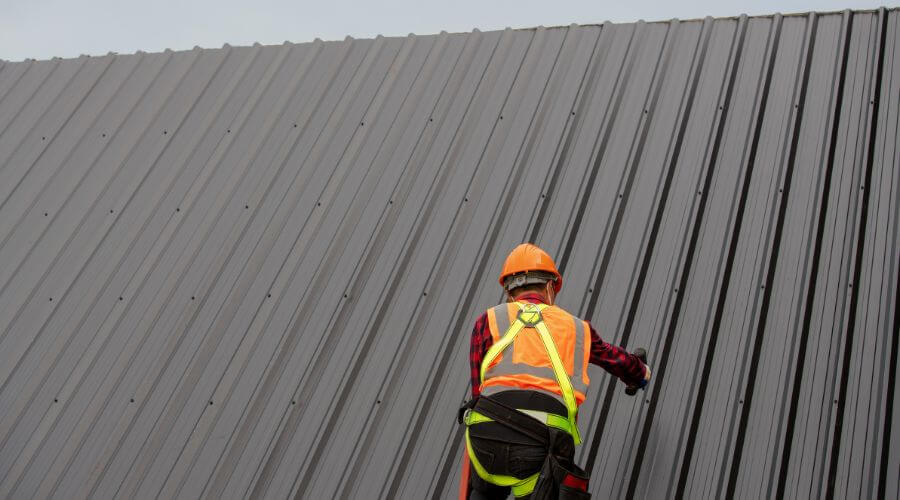 Professional metal roof installation services in Wellsville, MO